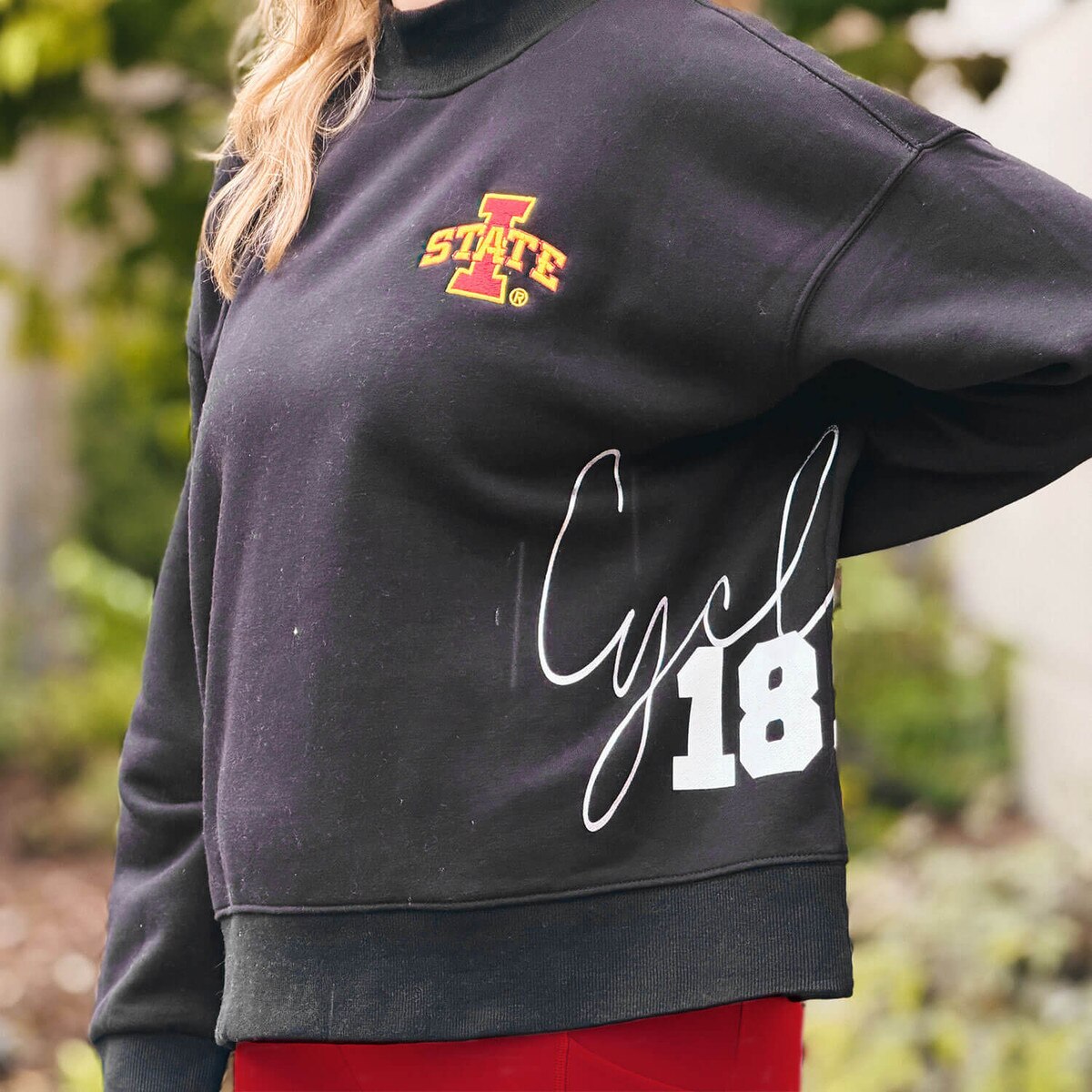 Posh Play Women's Cyclones 1858 Black Mock Neck design close up